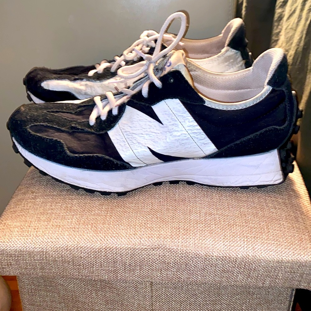 New balance, black and white shoes, worn but still have some life in them